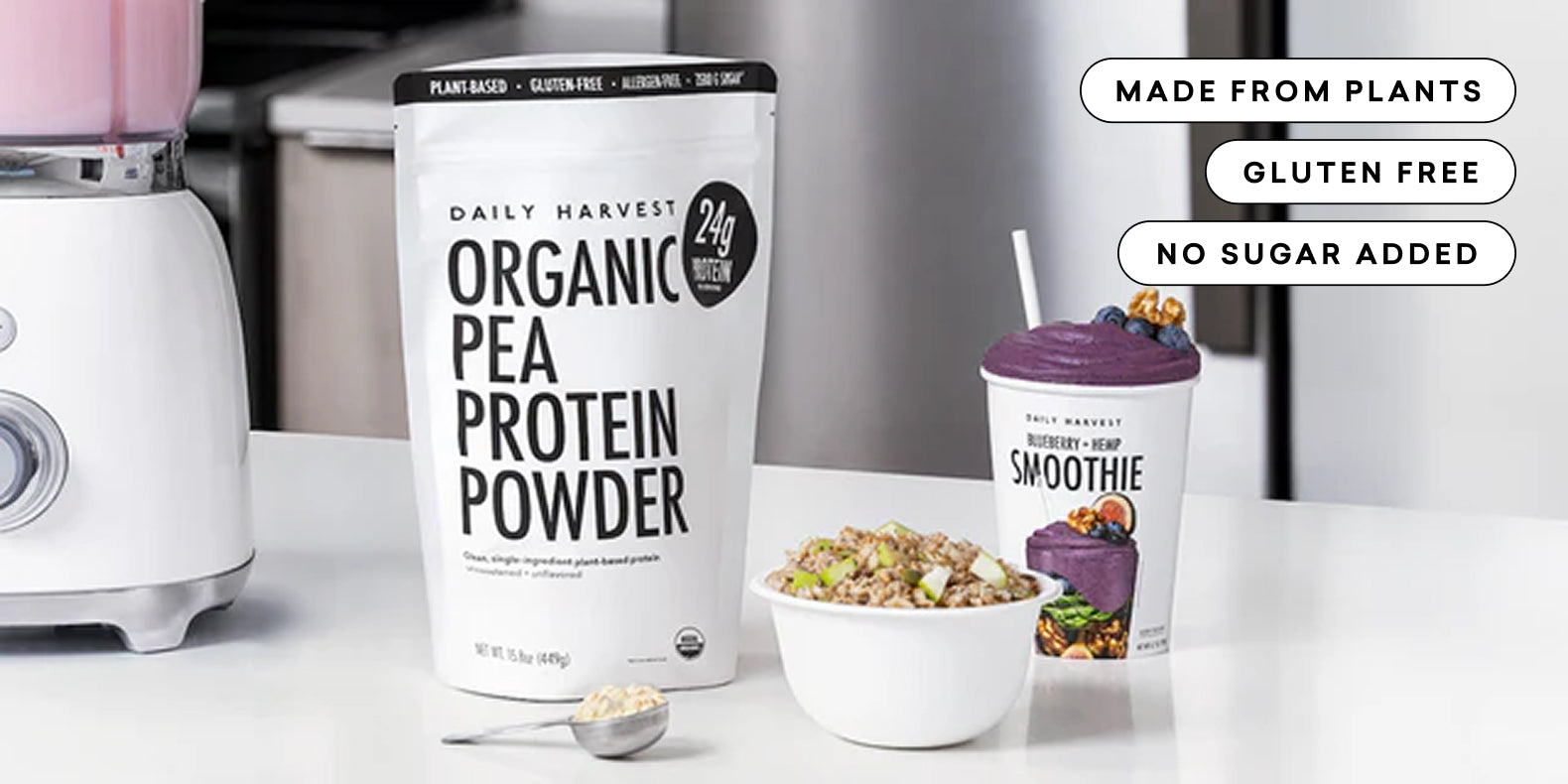 Organic pea protein powder with smoothie and bowl, made from plants, gluten free, and no sugar added on white counter.