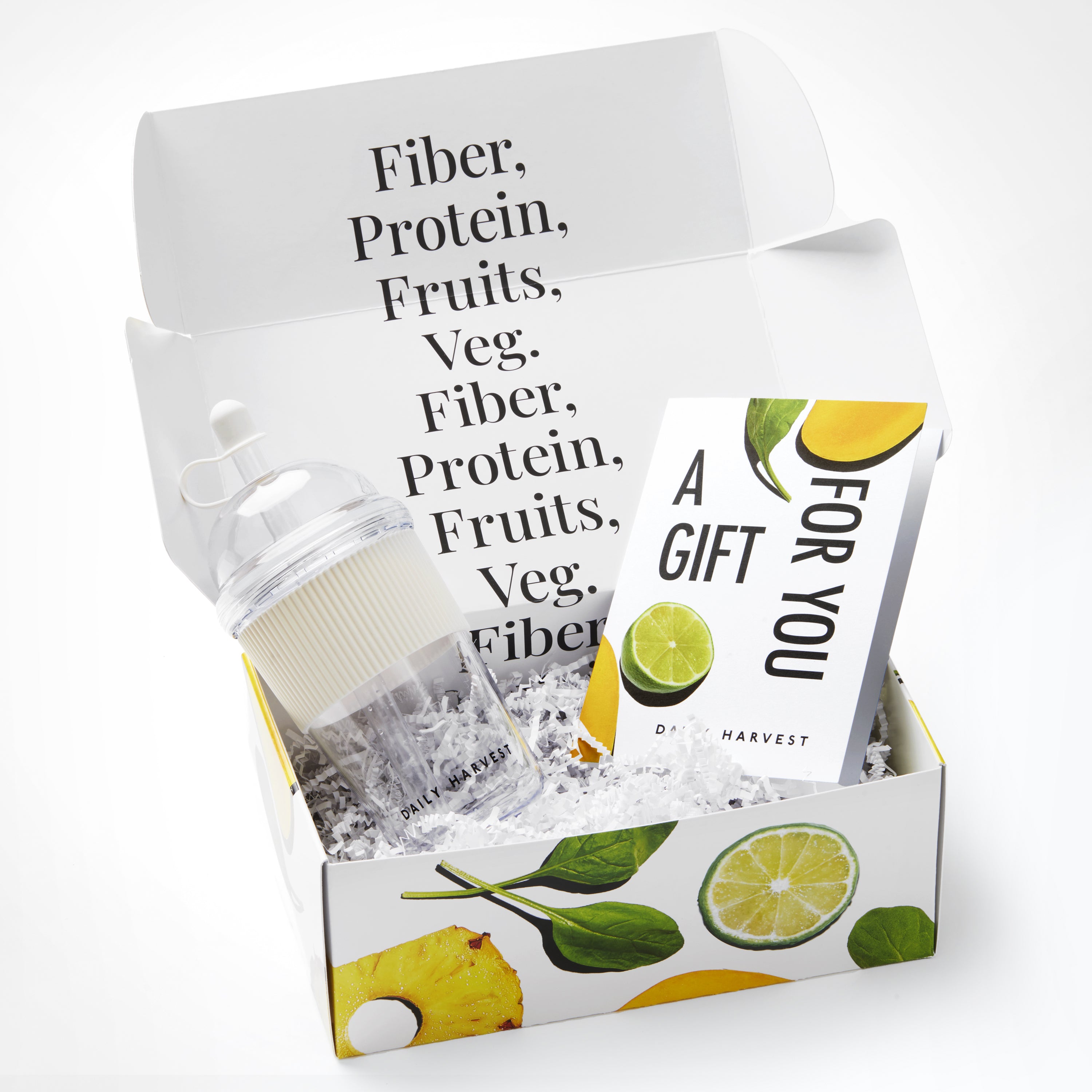 Gift box with health-related items and a card inside