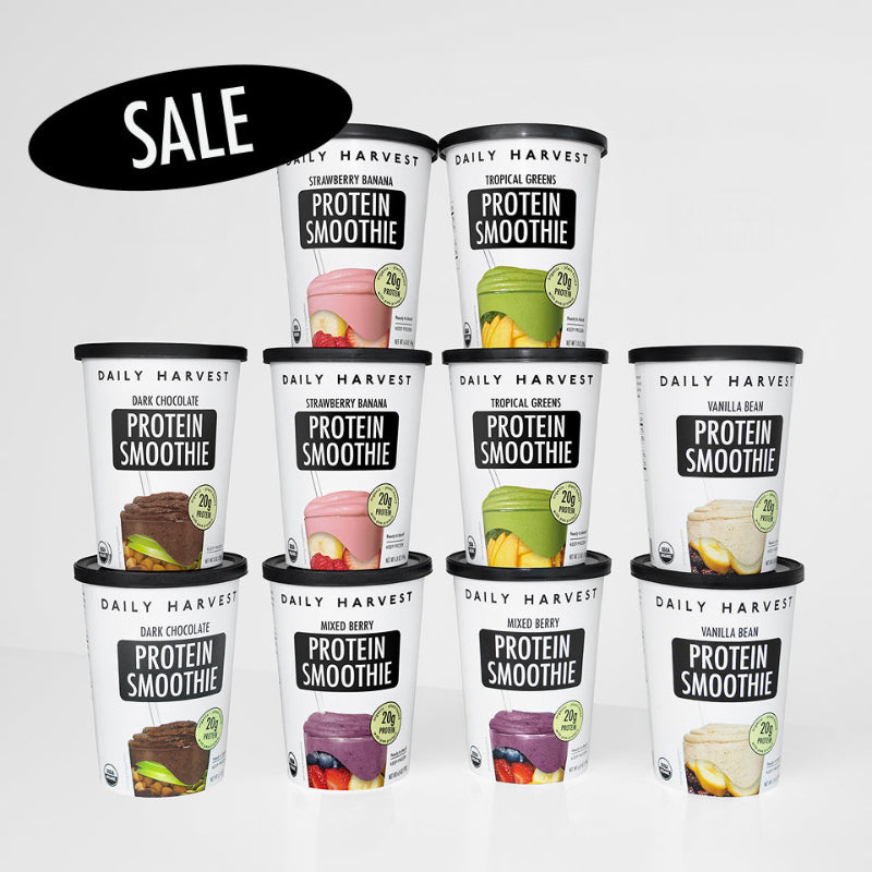 Daily Harvest Protein Smoothie containers with various flavors on a white background