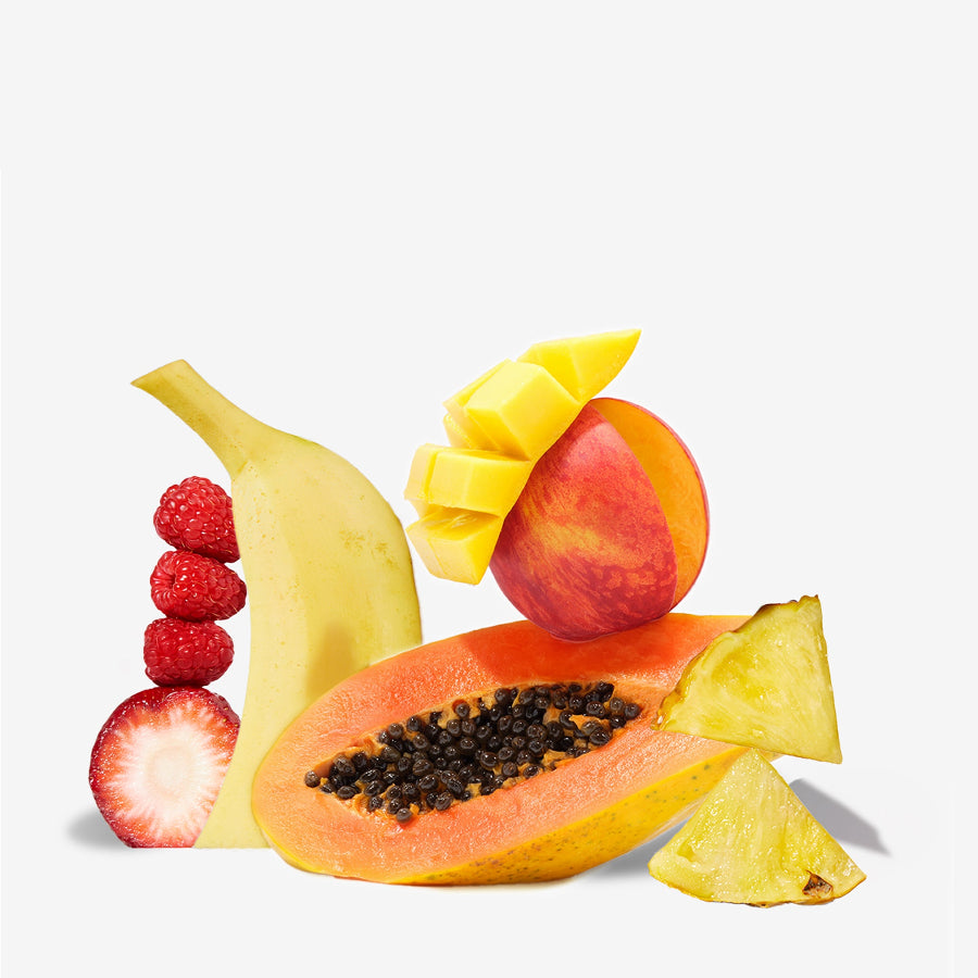 Fruit arrangement including a banana, papaya, mango, strawberry, and pineapple on a white background