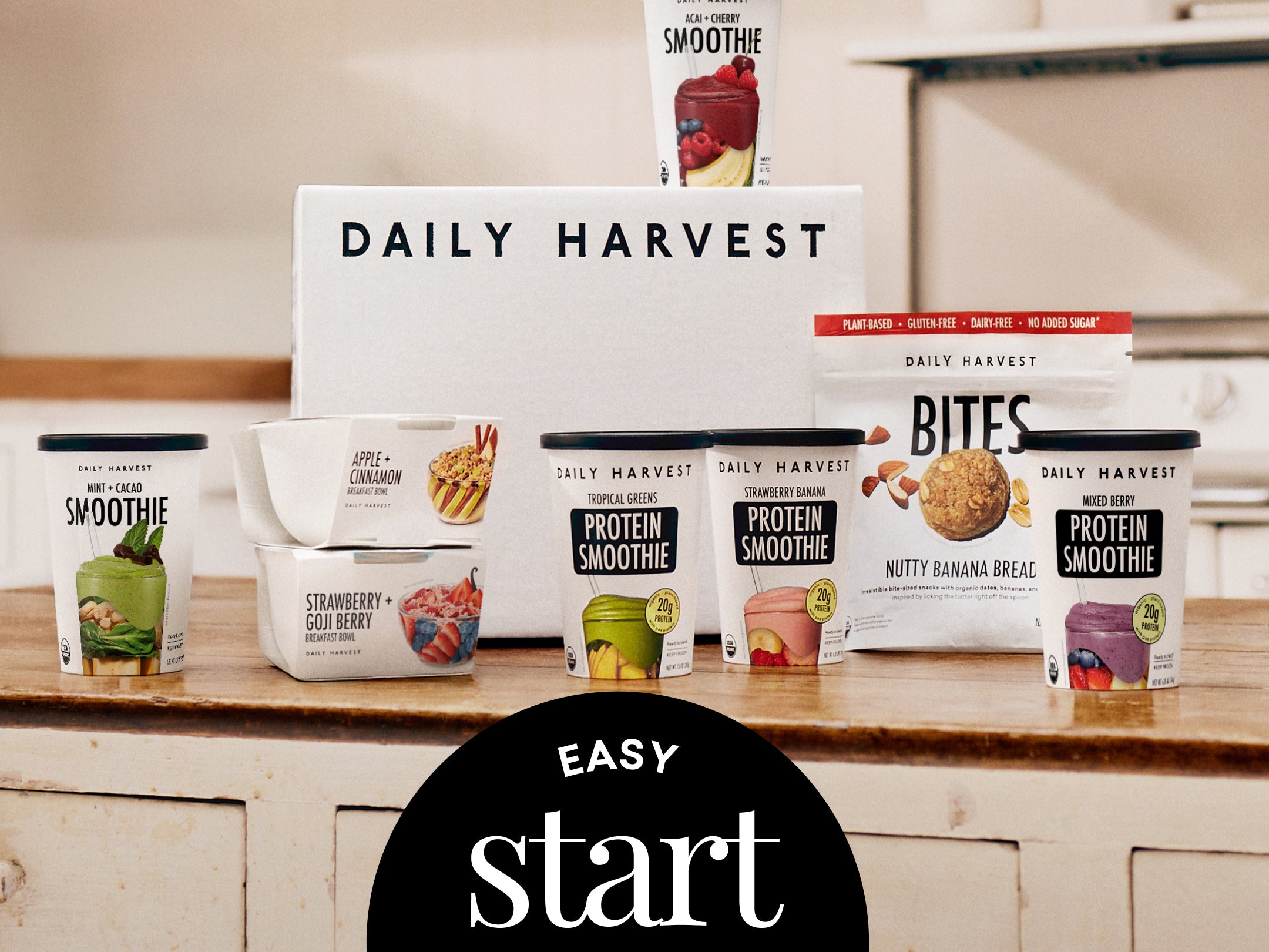 Daily Harvest smoothie containers and packaging on a kitchen counter with 'Easy Start' text.