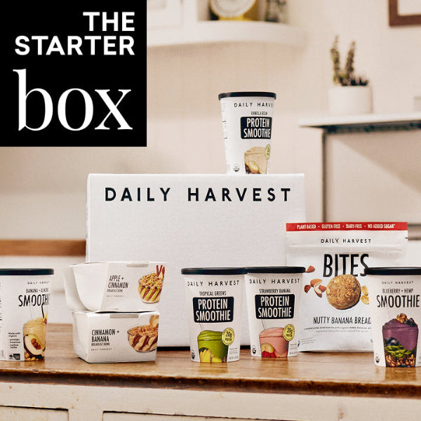 Daily Harvest products including smoothie containers and packaging on a kitchen counter.