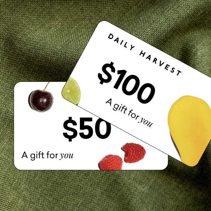 Minimalist Daily Harvest gift card with a dollar sign and message A gift for you on a white background