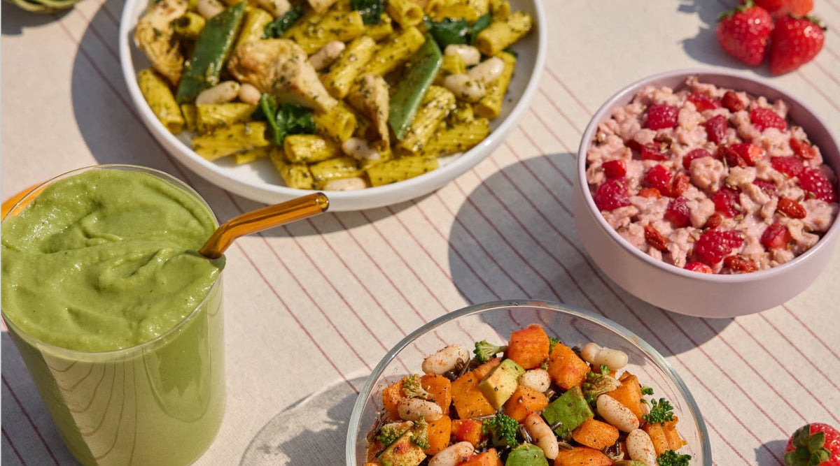 Daily Harvest pasta, smoothie and oat bowl on a table