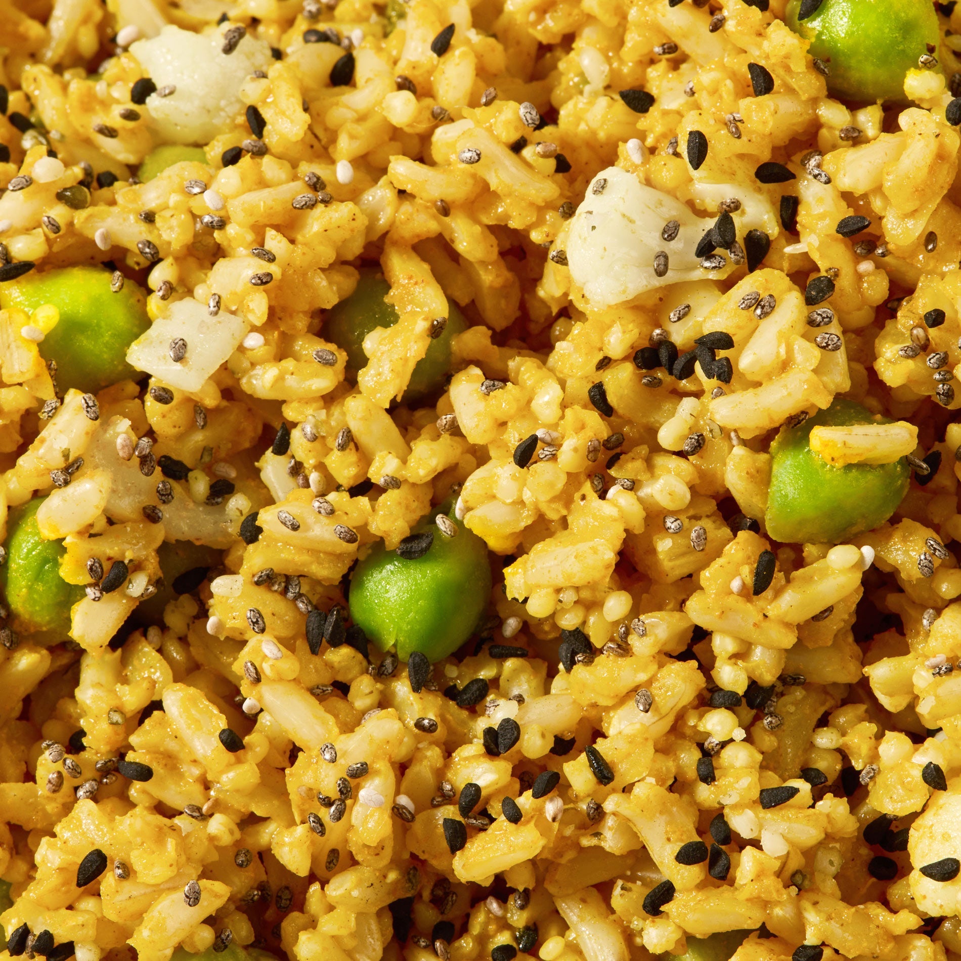 A close-up shot of our Curried Brown Rice and Green Chickpea Grains.